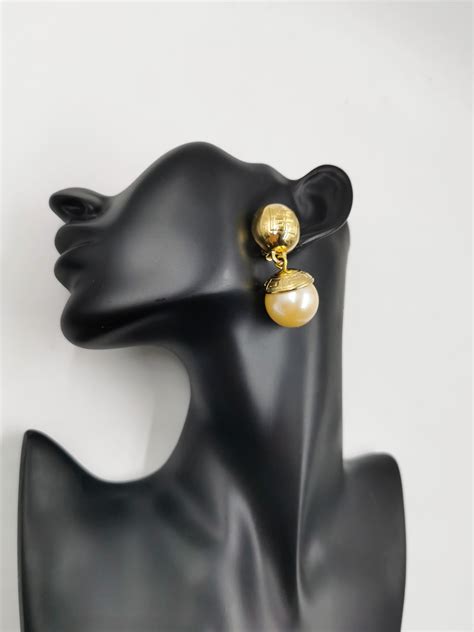 black and gold givenchy earrings|givenchy pearl c earrings.